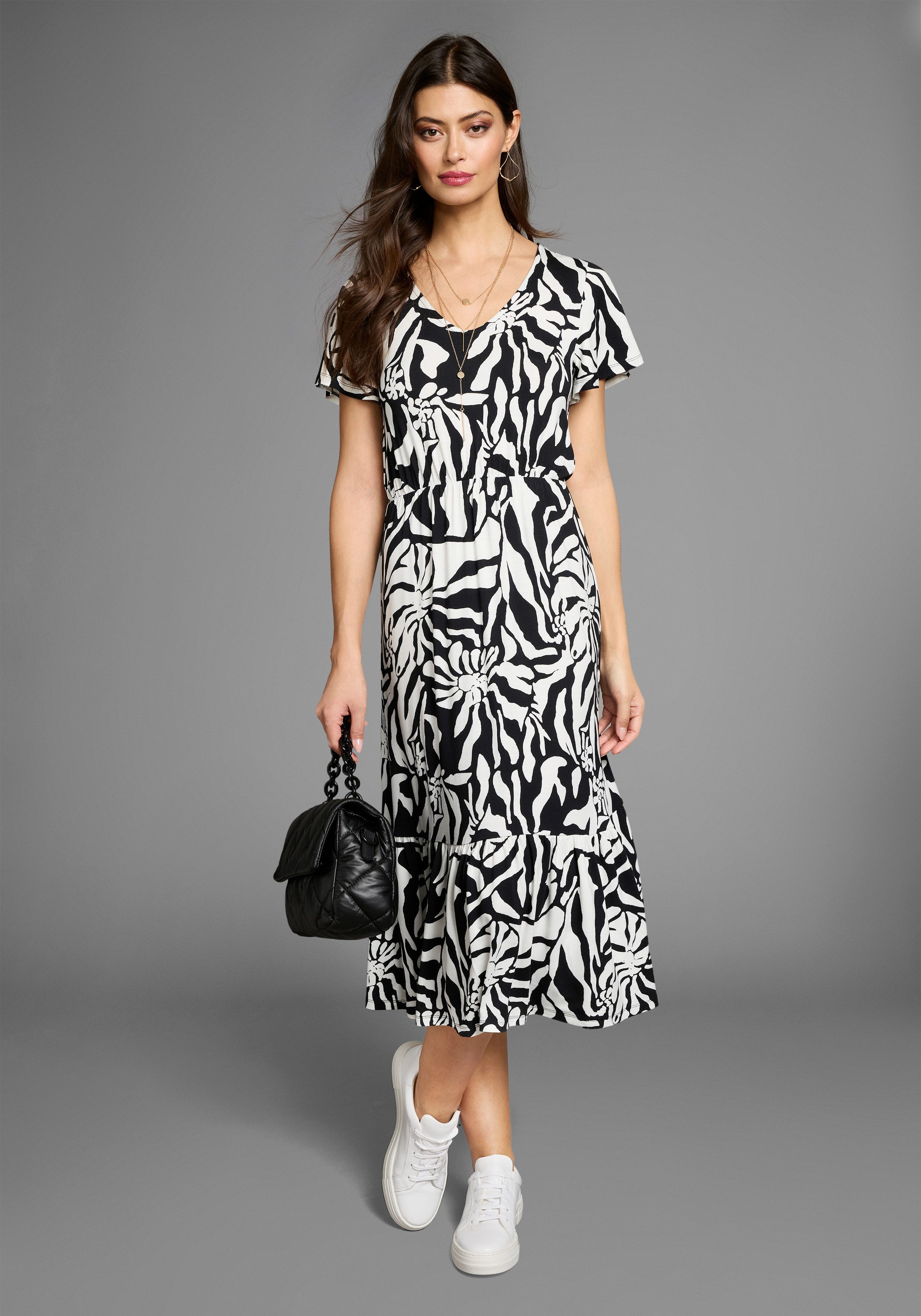 Laura Scott Midi-jurk in opvallend zebra-look met vleugel mouwen - nieuwe collectie