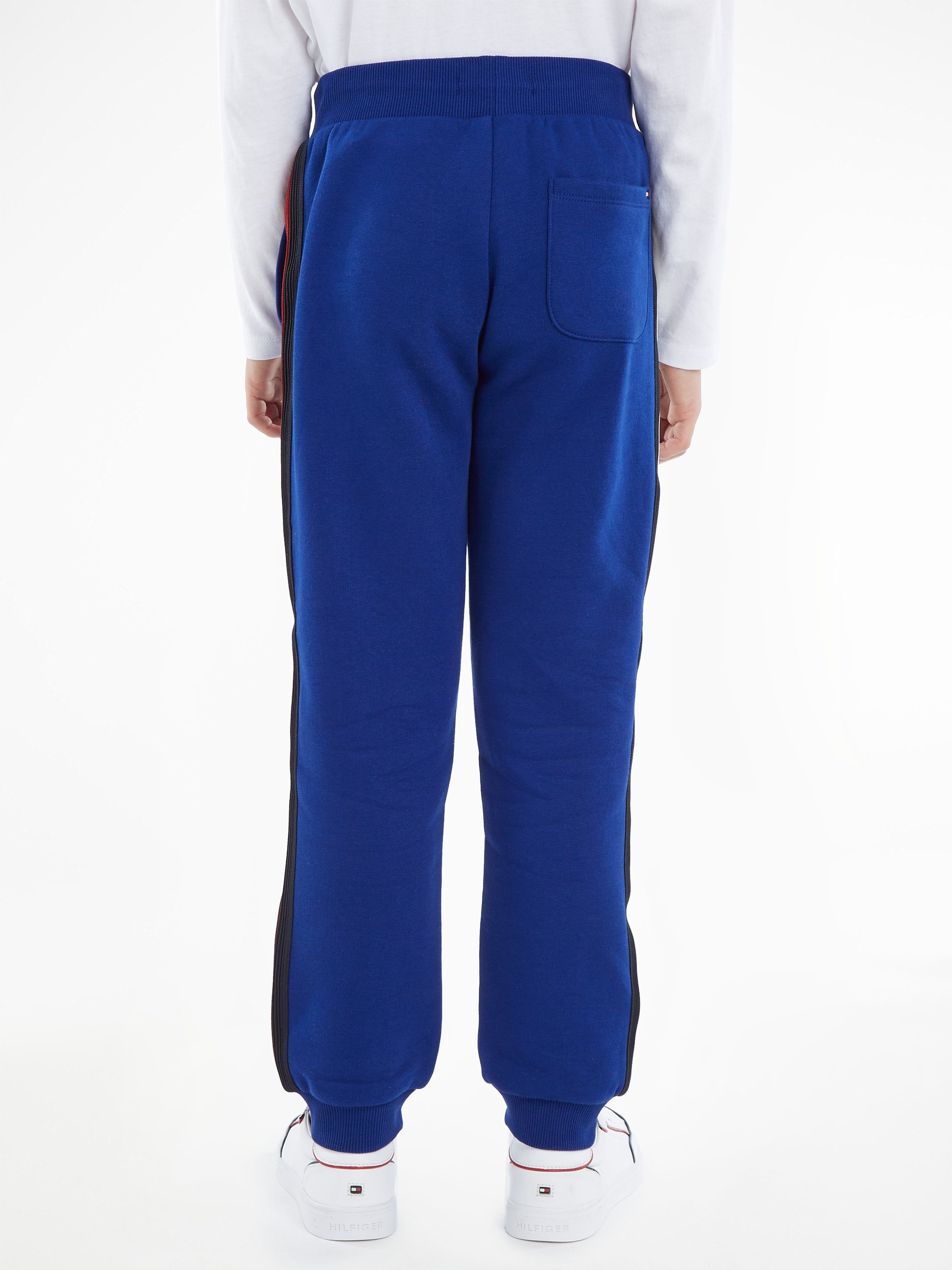 Tommy Hilfiger Sweatbroek GLOBAL STRIPES SWEATPANTS met colorblocking strepen aan de zijnaad