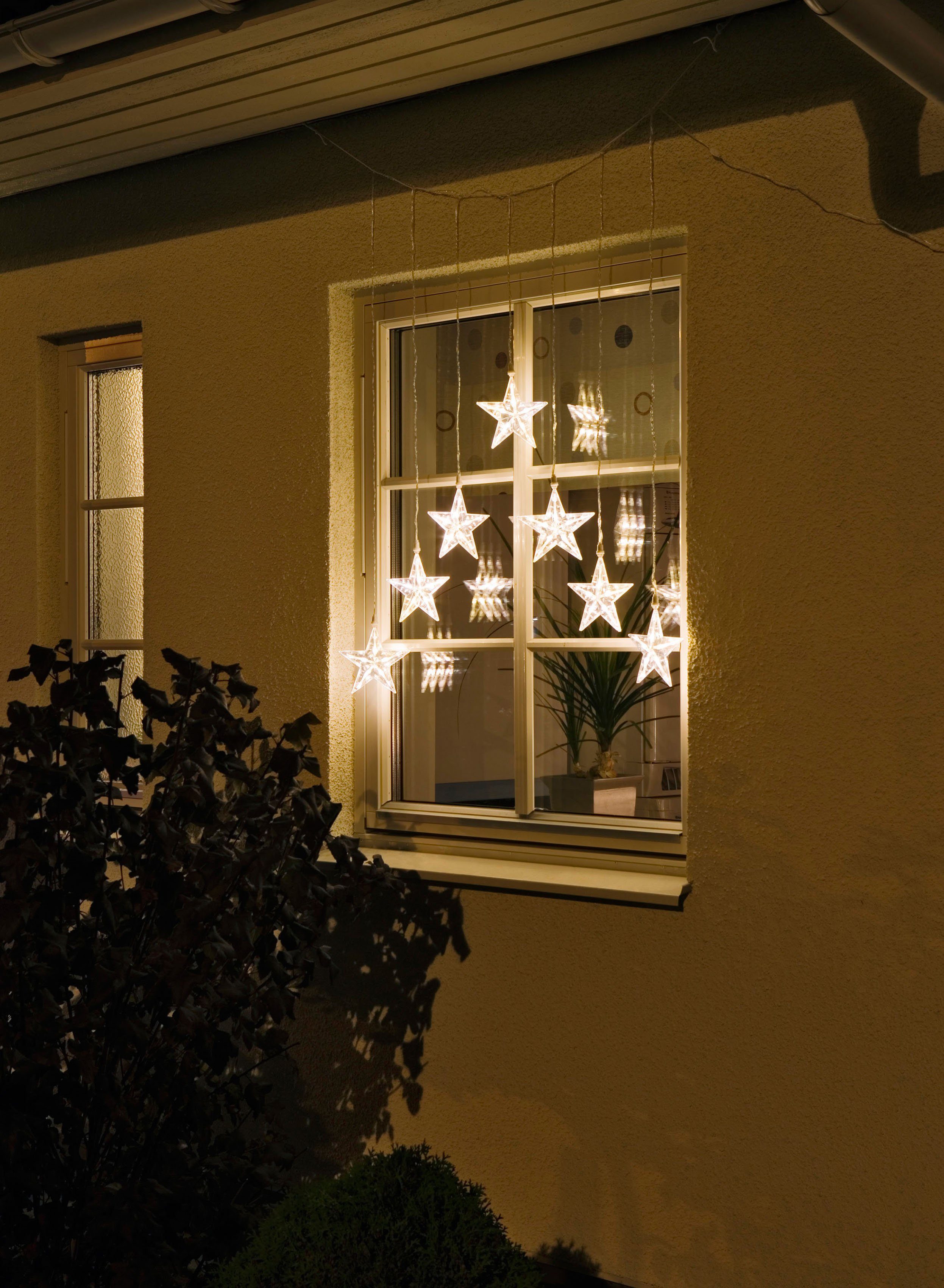 KONSTSMIDE Led-lichtgordijn Kerstversiering buiten met 7 sterretjes, 35 warmwitte dioden, transparante kabel