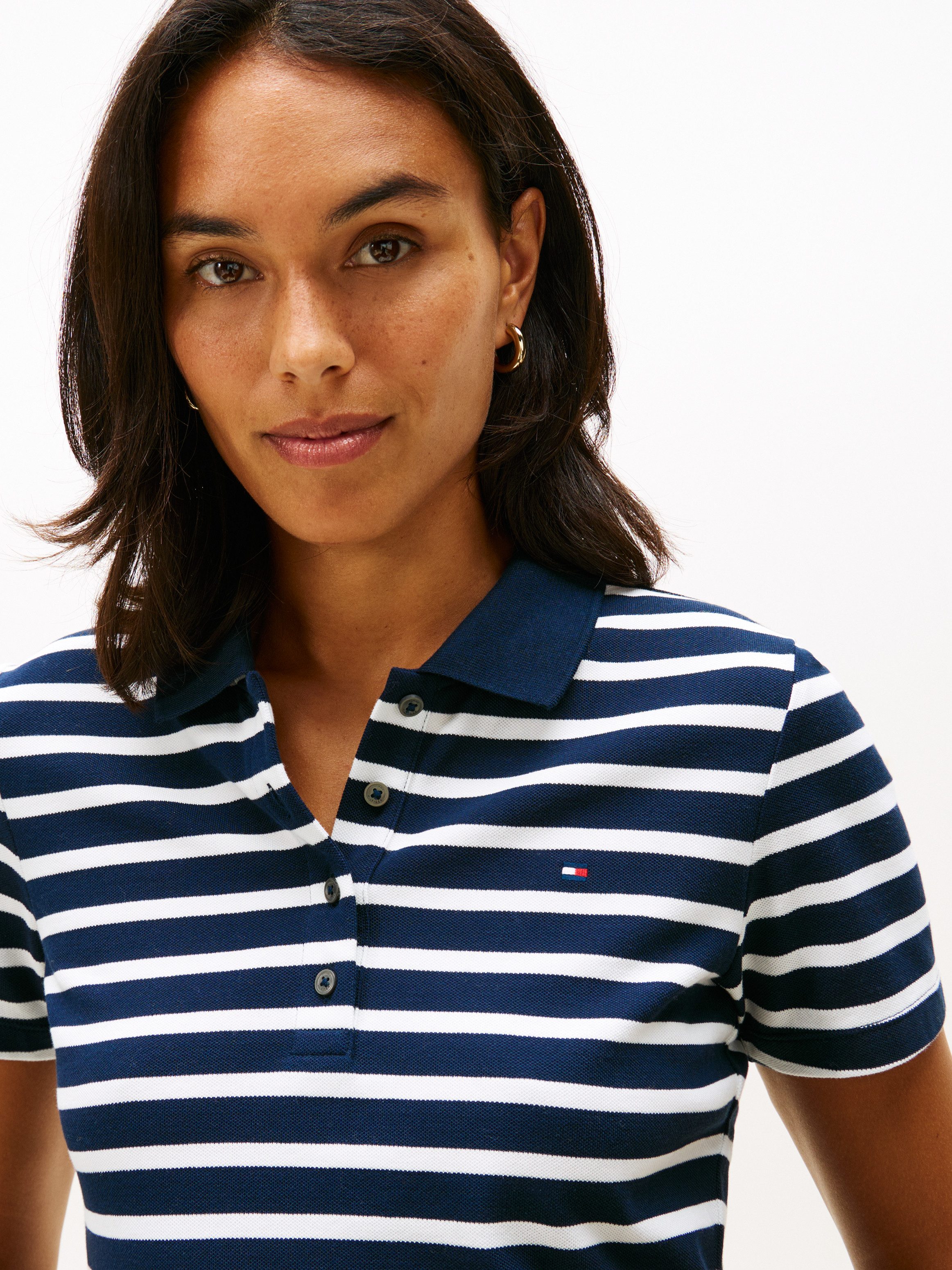 Tommy Hilfiger Poloshirt 1985 Slim Fit Pique Premium met logo-borduursel, met zijsplitten