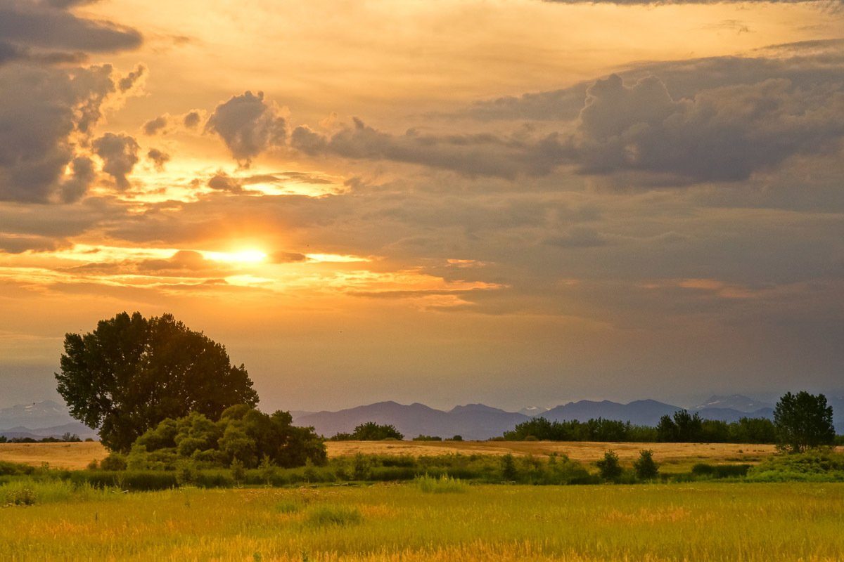 Papermoon Fotobehang Sonnenuntergangslandschaft