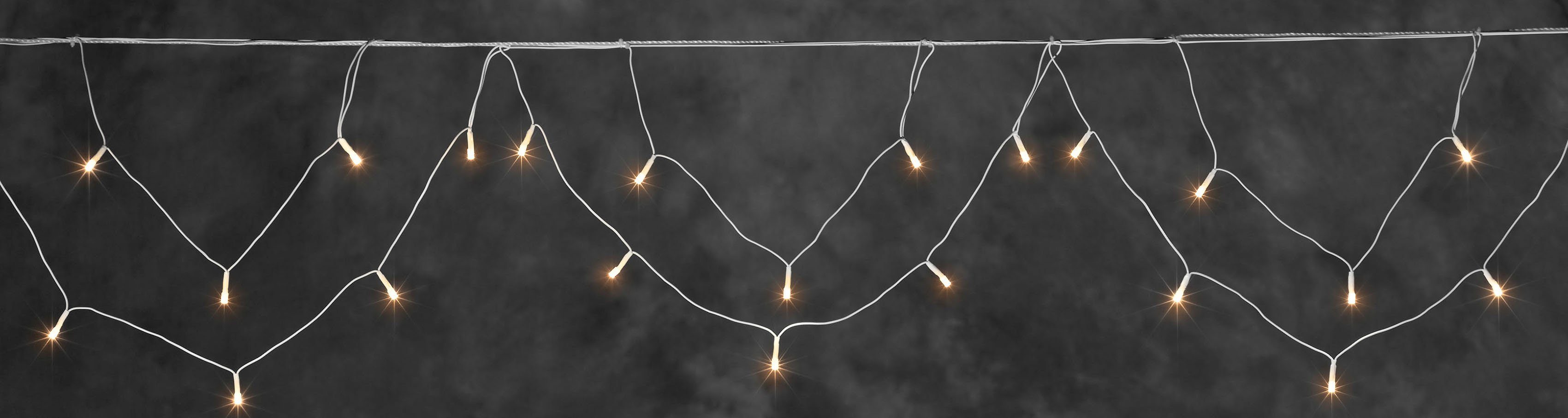 KONSTSMIDE Led-lichtgordijn Kerstversiering buiten Led lichtsnoer voor de dakgoot, gebogen vorm, buitentransformator, witte kabel