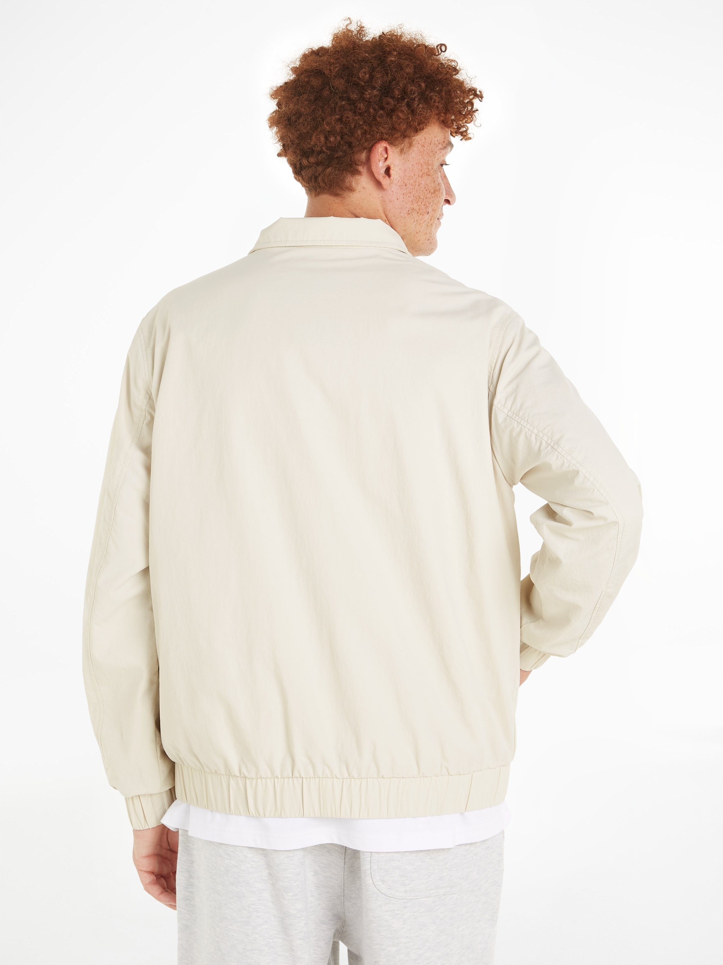 TOMMY JEANS Kort jack TJM ESSENTIAL JACKET EXT Bomberjack met staande kraag