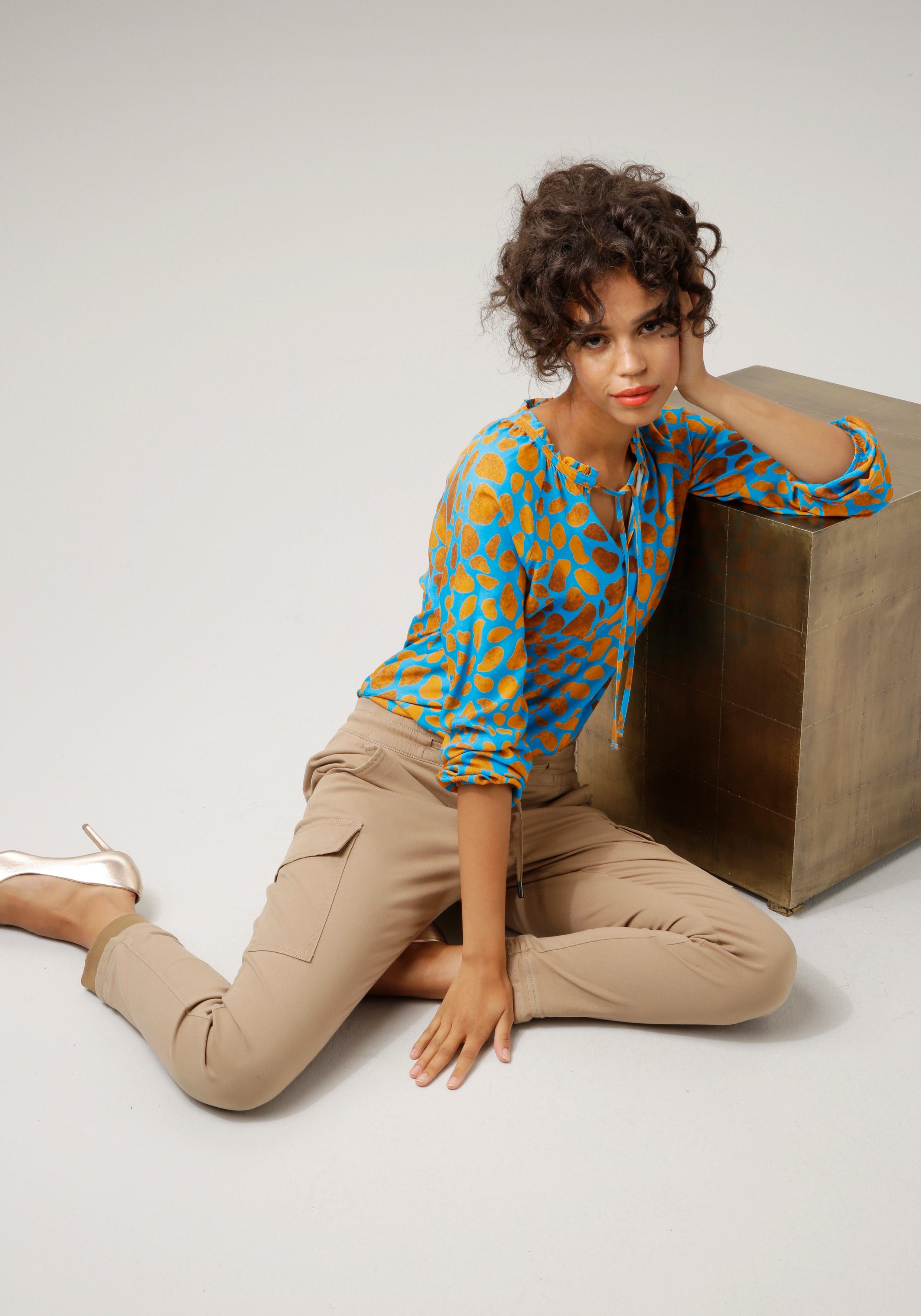 Aniston CASUAL Blouse zonder sluiting met interessante alloverprint